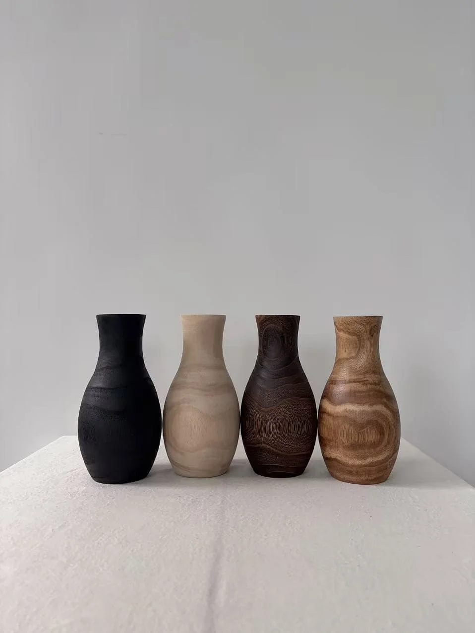 Colorful painted wood vase finishes