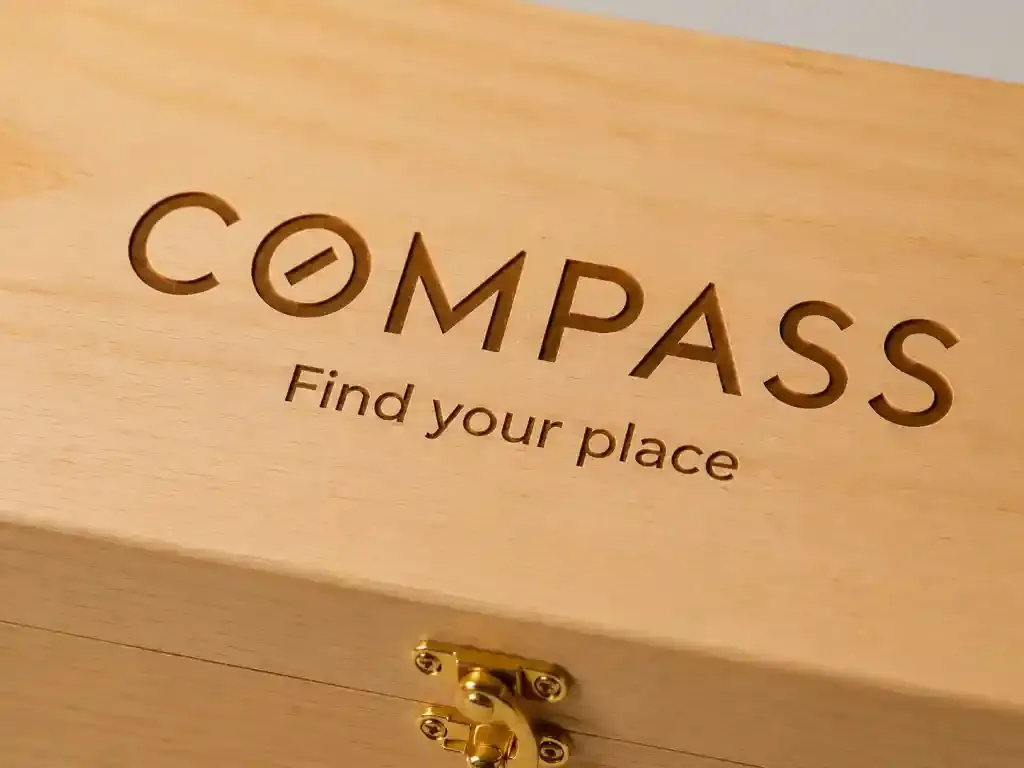 Real estate logo on a wooden wine box for corporate gifting